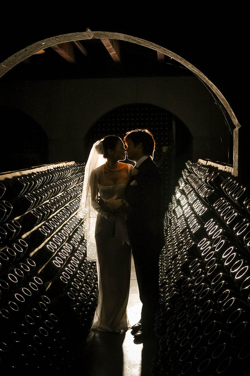 Bride and Groom in Gloria Ferrer Champagne Cellar